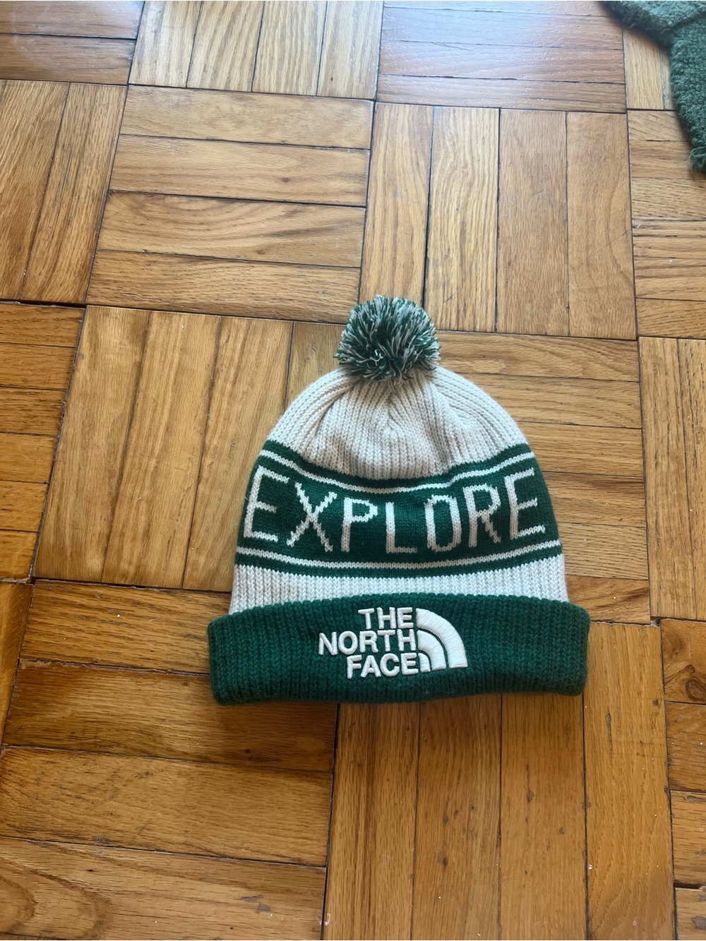 The North Face Green & Cream beanie. Tall size beanie.